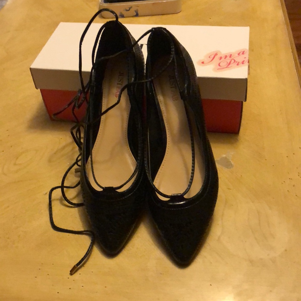 Black strapped flats